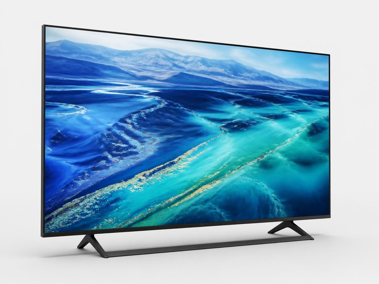 Veltech 43-inch 4K smart TV on a slim metal stand showing a vivid landscape